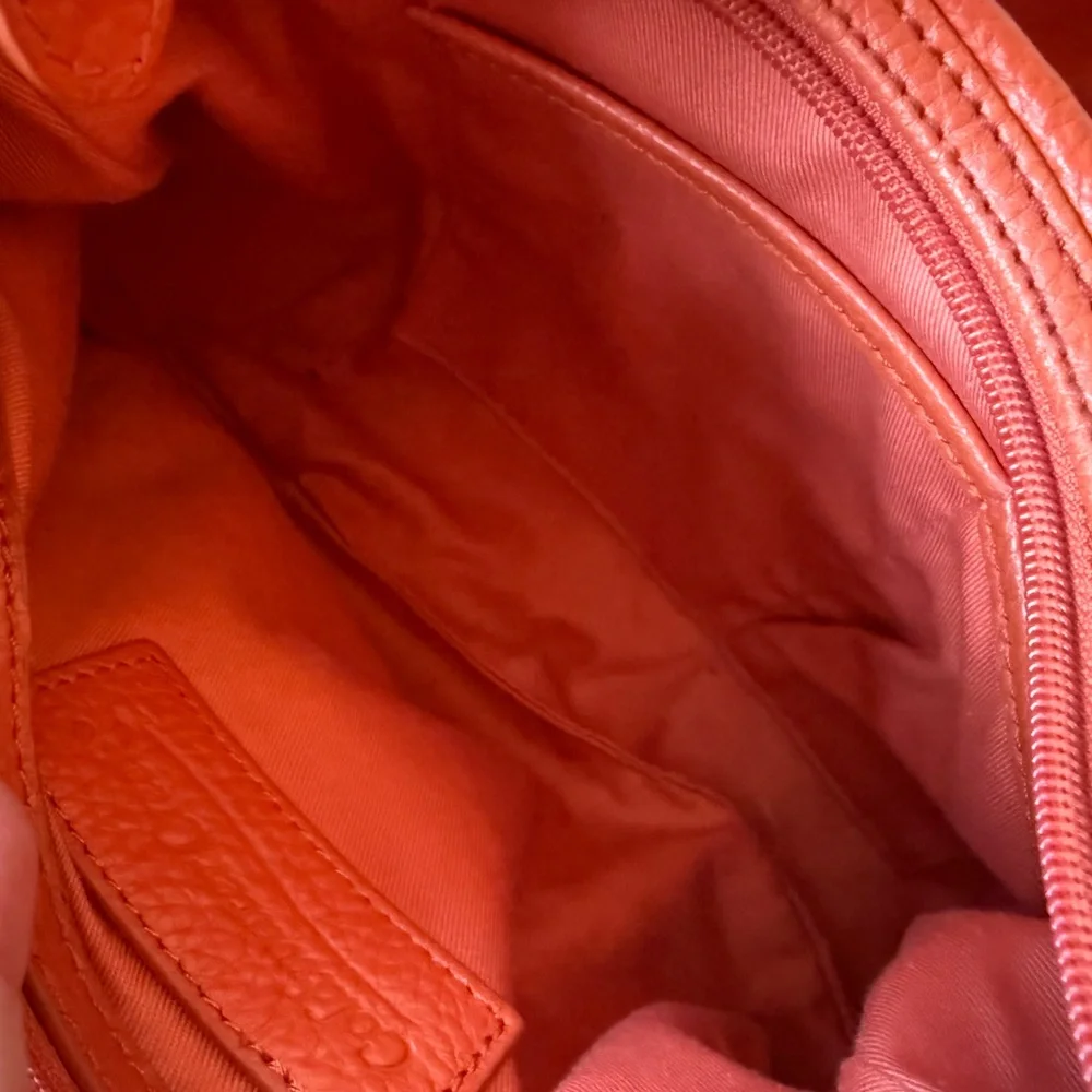 Coldwater Creek Pebbled Leather Orange Fringe Medium Hobo Bag